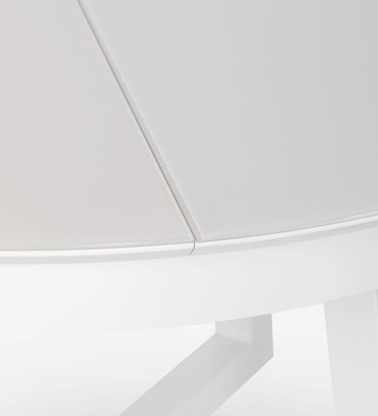 Round extendable dining table in pearl lacquer with glass top and pearl lacquer extension.