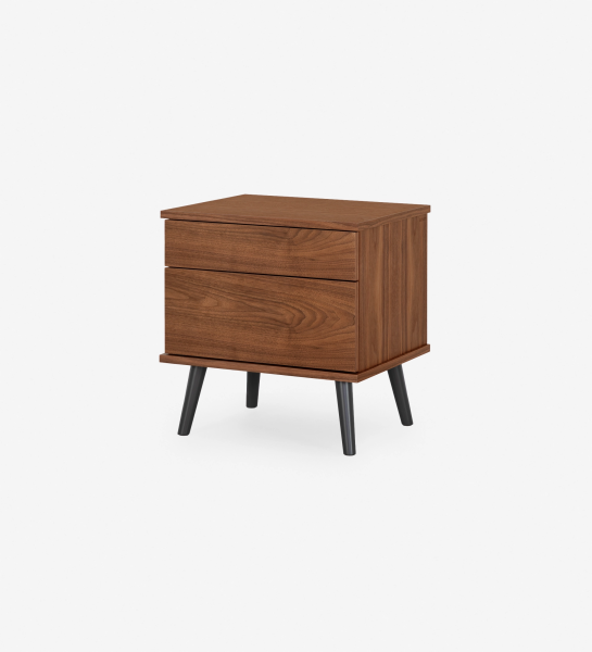 Oslo bedside table with 2 drawers and structure in natural walnut veneer. Black lacquered legs. Dimensions: 55 x 57.5 cm.