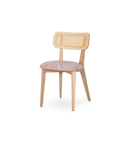 Wood chair, with rattan detail on the back and multicolored fabric upholstered seat, primarily magenta.