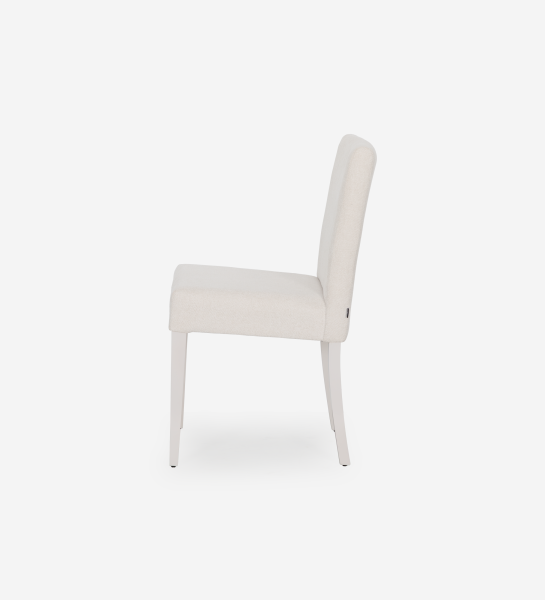 Chair upholstered in fabric, pearl lacquered feet.