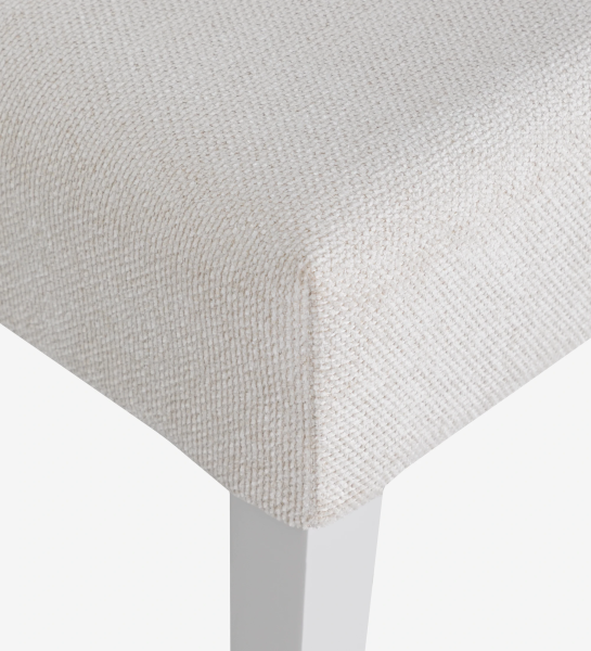 Chair upholstered in fabric, pearl lacquered feet.
