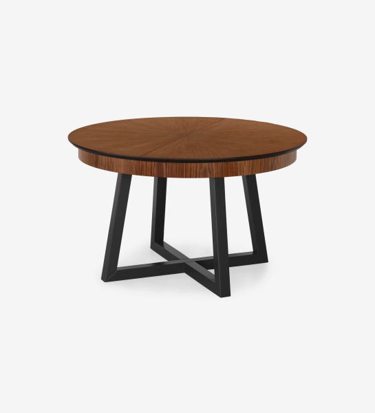 Round extendable dining table with natural walnut top and black lacquered legs.