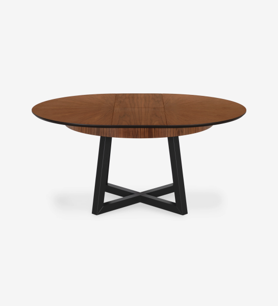 Round extendable dining table with natural walnut top and black lacquered legs.