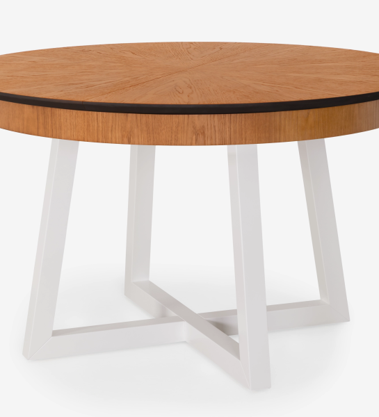 Mesa de comedor redonda extensible con tablero de roble miel y patas lacadas en perla.