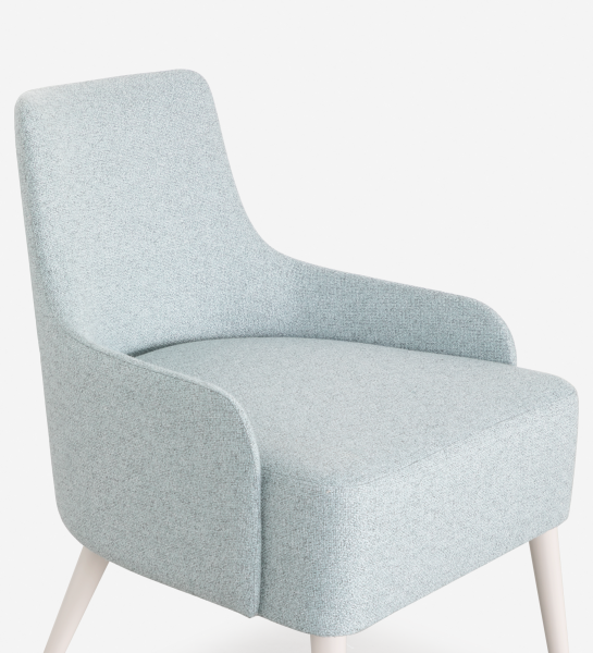 Oslo armchair upholstered in blue fabric, pearl lacquered feet.