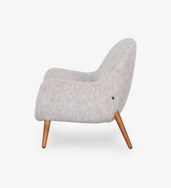 Oslo armchair upholstered in grey velvet-like fabric, with honey-coloured ash wood legs.