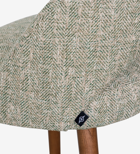 Stool upholstered in green fabric, with walnut-colored wood leg.