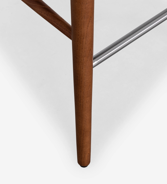 Stool upholstered in green fabric, with walnut-colored wood leg.