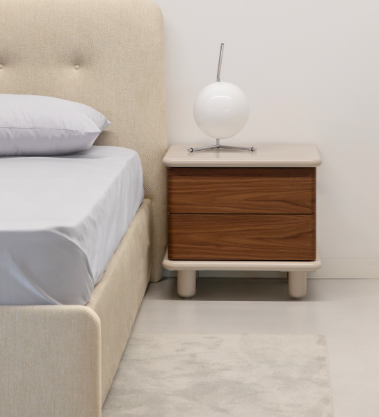 Bedside table with 2 drawers in natural walnut, pearl structure, and integrated wireless phone charger in the top.