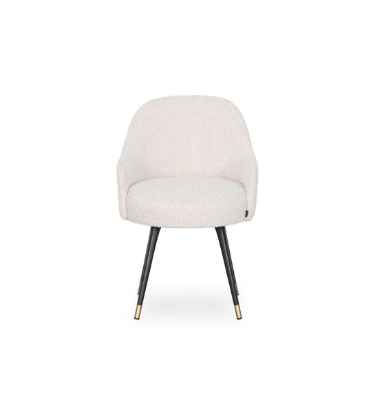Silla giratoria tapizada en tejido perla con pies lacados en negro y detalles dorados.