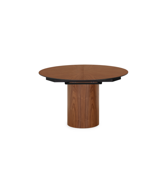Round extendable dining table Ø 130 cm, sunburst top and natural walnut base, with black lacquered top detail.