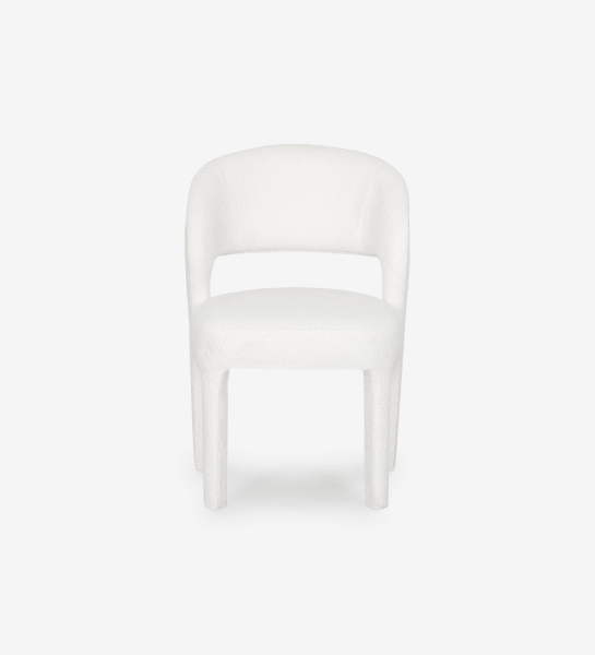 Chair upholstered in white fabric.