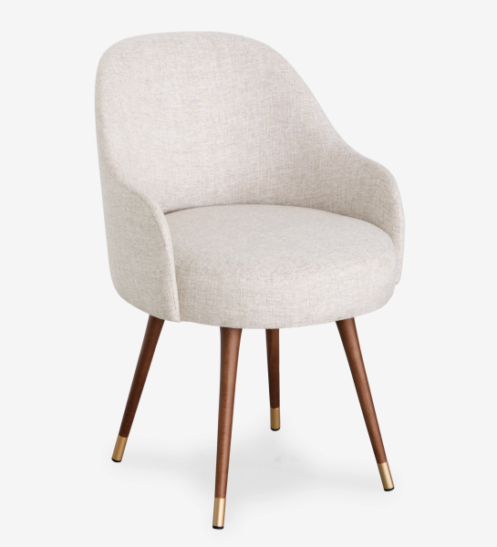 Geneve Chair beige upholstered dining chair with rounded back and walnut legs with brass caps