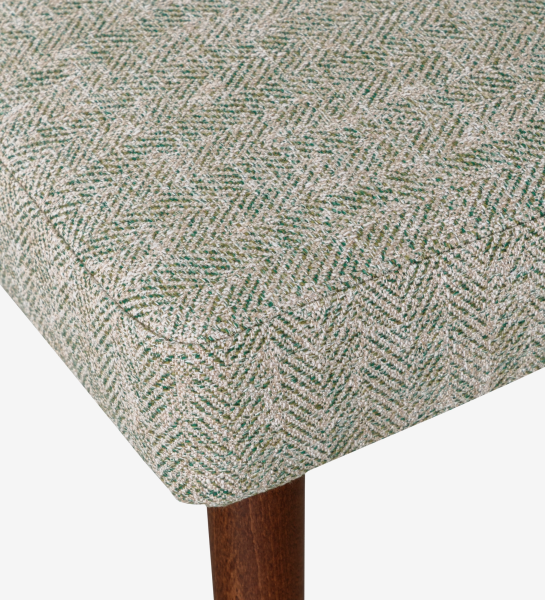 Paris Chair close-up of green herringbone upholstered seat corner with wooden leg