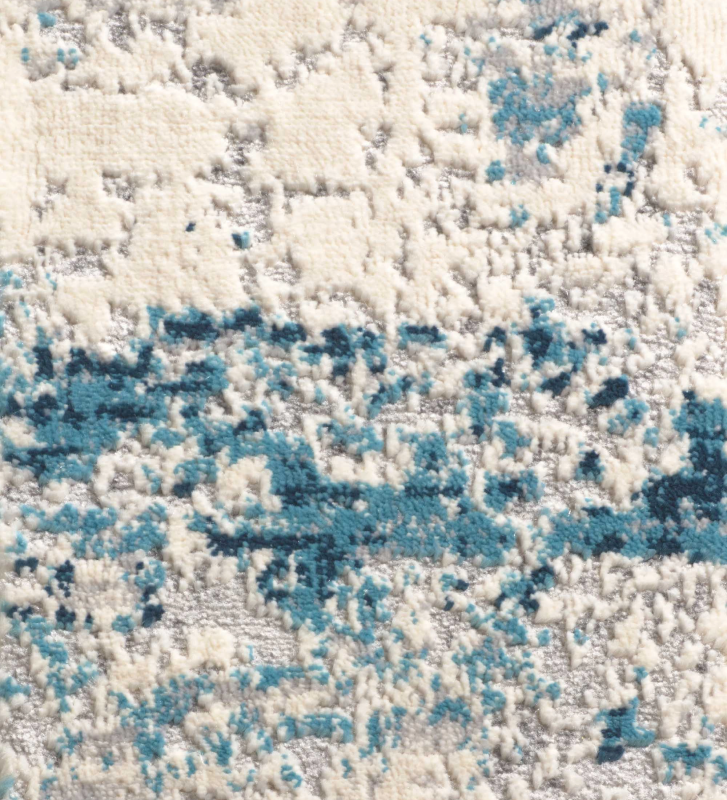 Tapis abstrait aux tons bleus, finition bord plié + feutre feltex 6 mm.