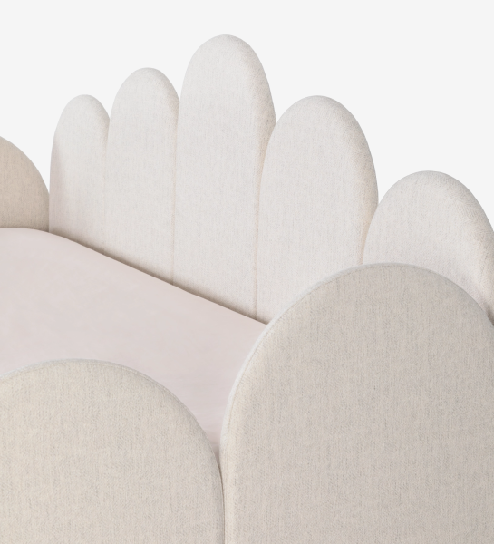 Lit de Divan avec structure et façade de tiroir rembourrées en tissu perle, avec lit dans le tiroir inférieur.