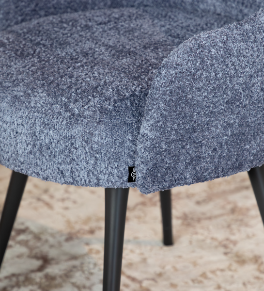 Blue fabric upholstered swivel chair with black lacquered legs 