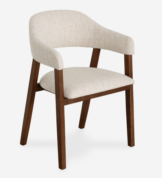 Chair with arms, in walnut-colored ash wood, with seat and back upholstered in beige fabric.