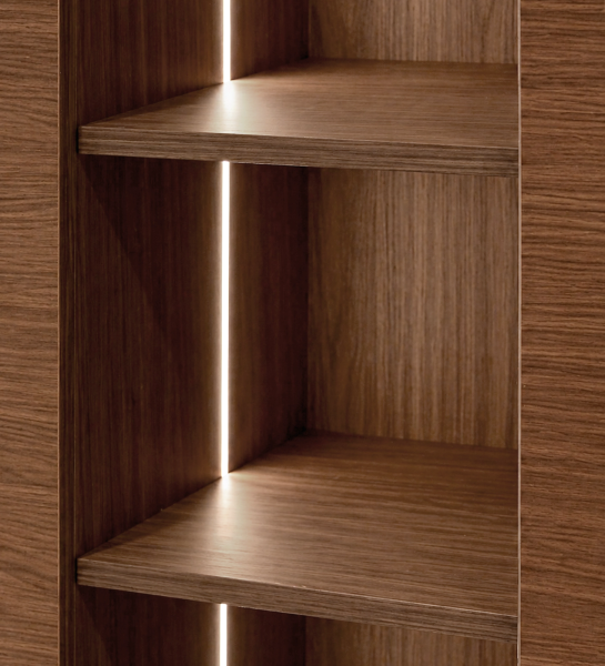 Lagos Cupboard interior close-up of walnut shelves with vertical LED strip light