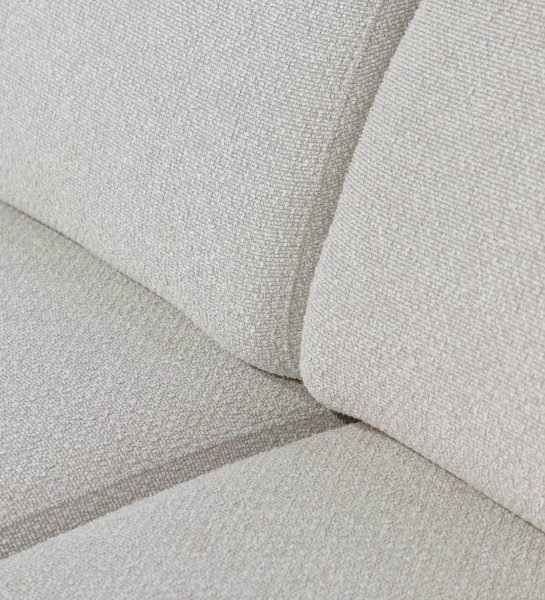 Detalle de tapizado beige texturizado del sofá Lagos