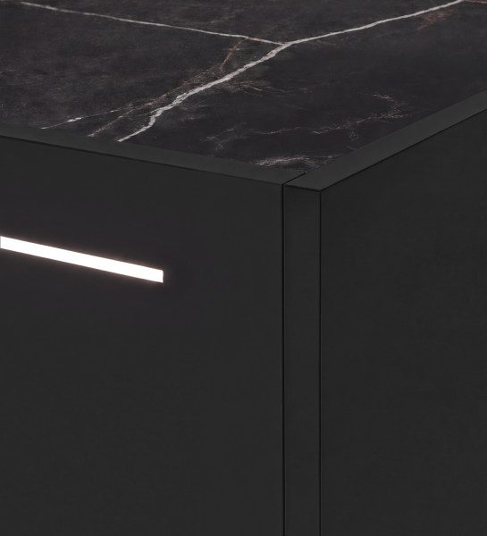 Lagos Bedside Table close-up of black corner with dark marble top and illuminated drawer strip