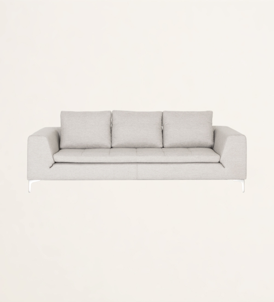 3 seater, upholstered in fabric and metal feet.