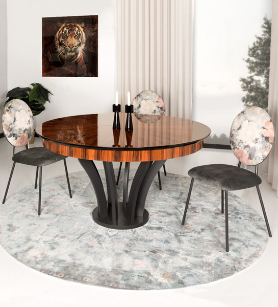 Mesa de comedor redonda extensible con tablero en palisandro alto brillo y pie lacado en negro.