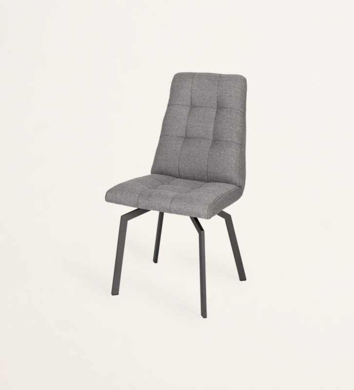 Cadeira estofada a tecido, com pés metálicos lacados a negro.