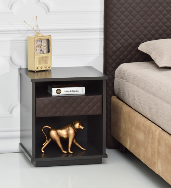 Bedside table with 1 drawer with fabric upholstered front, black lacquered frame.