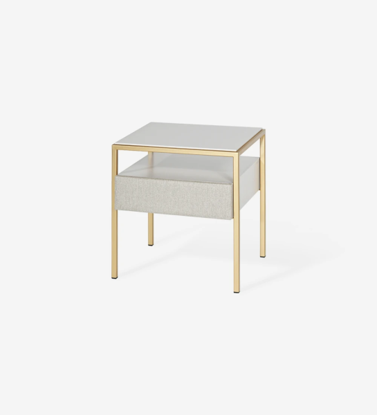 Bedside table with 1 drawer with fabric upholstered front, pearl lacquered top and drawer module, gold lacquered metal foot.
