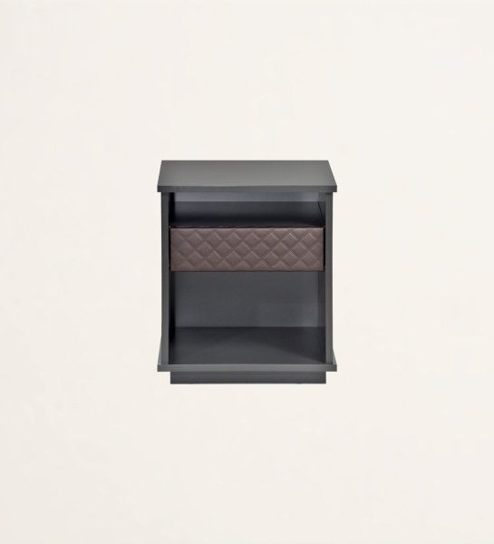 Table de chevet à 1 tiroir avec façade tapissée en tissu, structure noire laquée.
